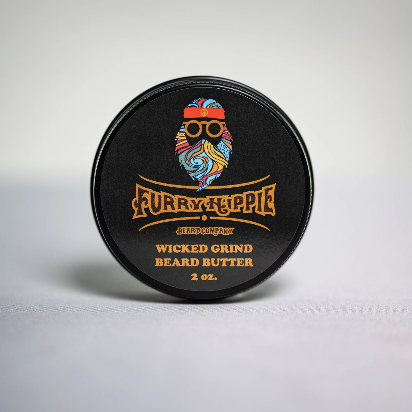 2oz jar of Wicked Grind peppermint mocha beard butter by Furry Hippie Beard Company